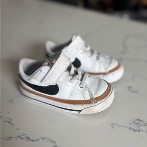 Nike Kids White Sneakers with Black Swoosh and Brown Trim